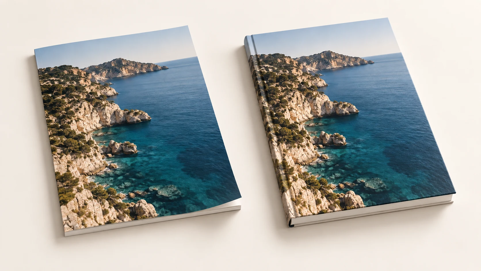 Softcover and hardcover Moments books side by side, with Mediterranean coastal photographs on their matte covers.